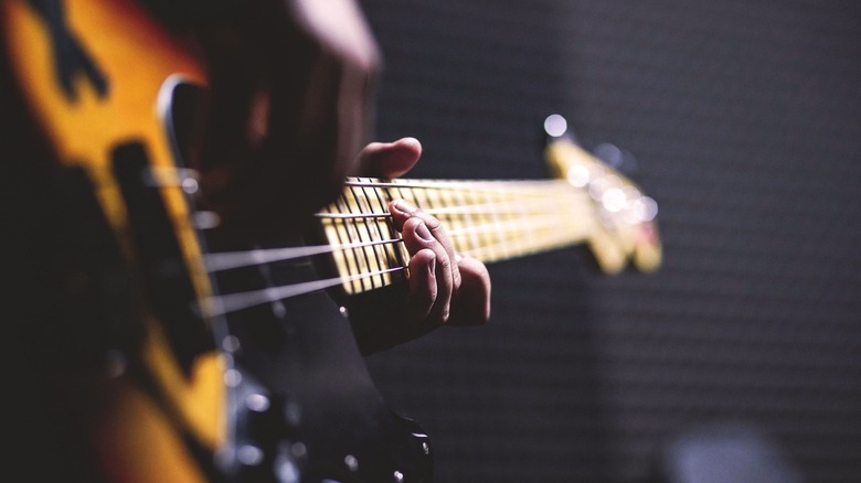 Bassist playing bass guitar